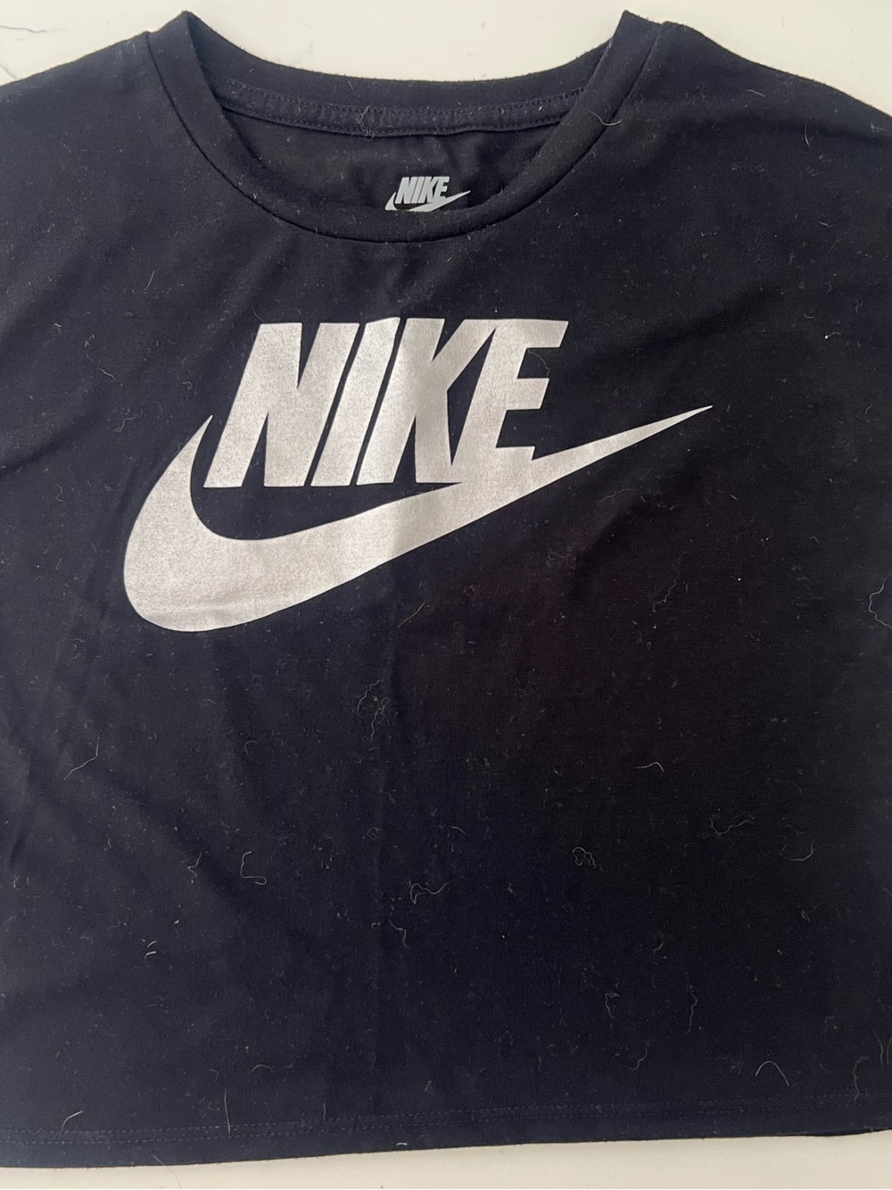 Girls cropped Nike Black Crop Tee with Silver Logo